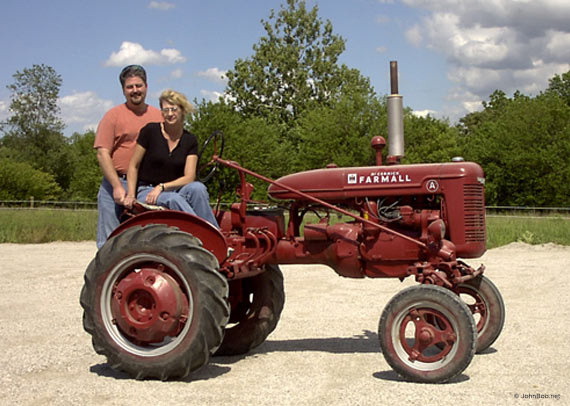 John and Grace on Farmall tractor